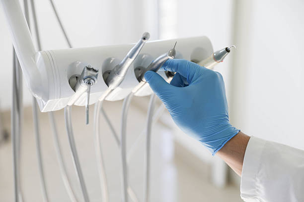 Professional Root Canal Treatment technician working in Lake Fenton, MI